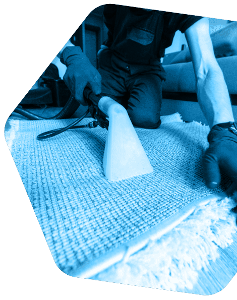 man-vacuuming-blue