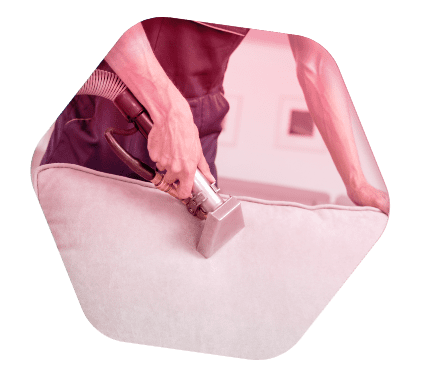 man-vacuuming-pink